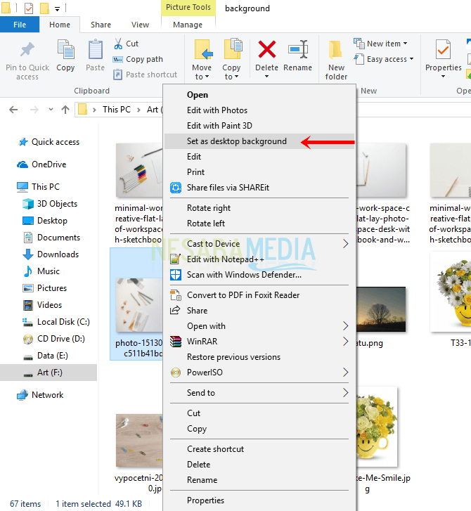Langkah 2 - klik kanan foto lalu set as background desktop